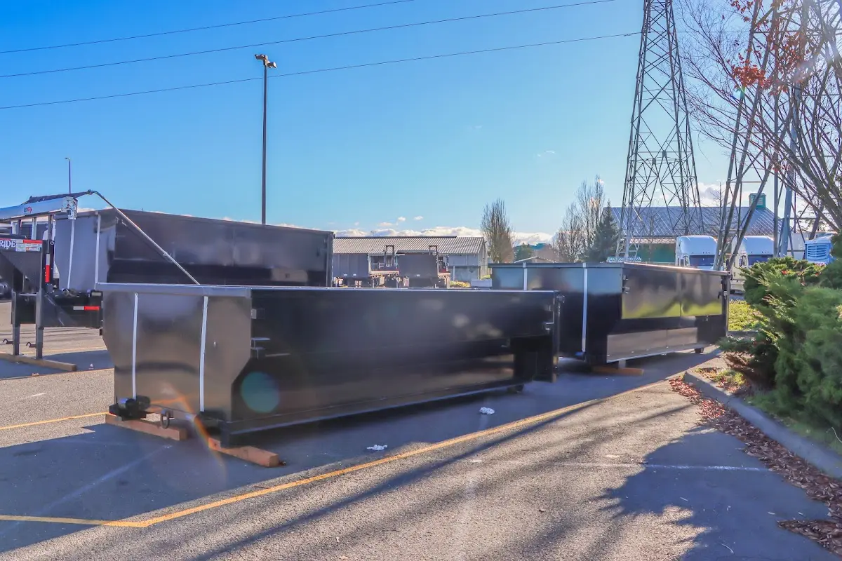Roll-off dumpster ready for waste disposal at job site for 6 Yard Dumpster Rental in Islip